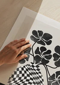 Abstract black and white vase with checkered pattern and flowers-9