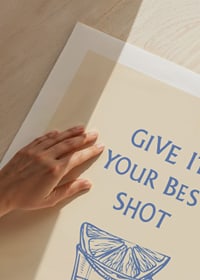 Illustration of shot glass with lemon slice and blue text-9