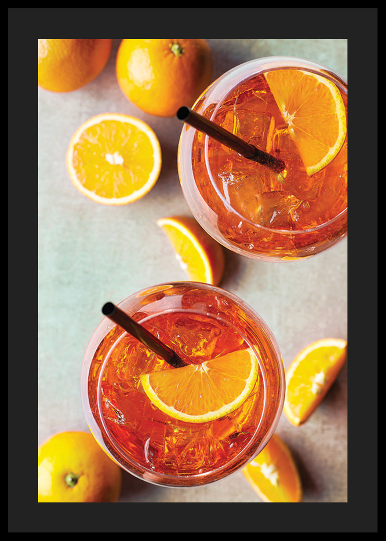 Photograph of two Aperol Spritz with orange slices from above-12