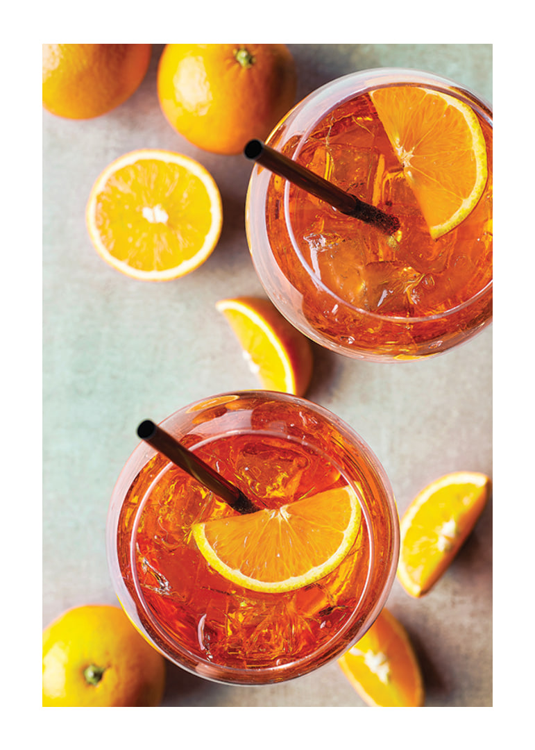 Photograph of two Aperol Spritz with orange slices from above-12