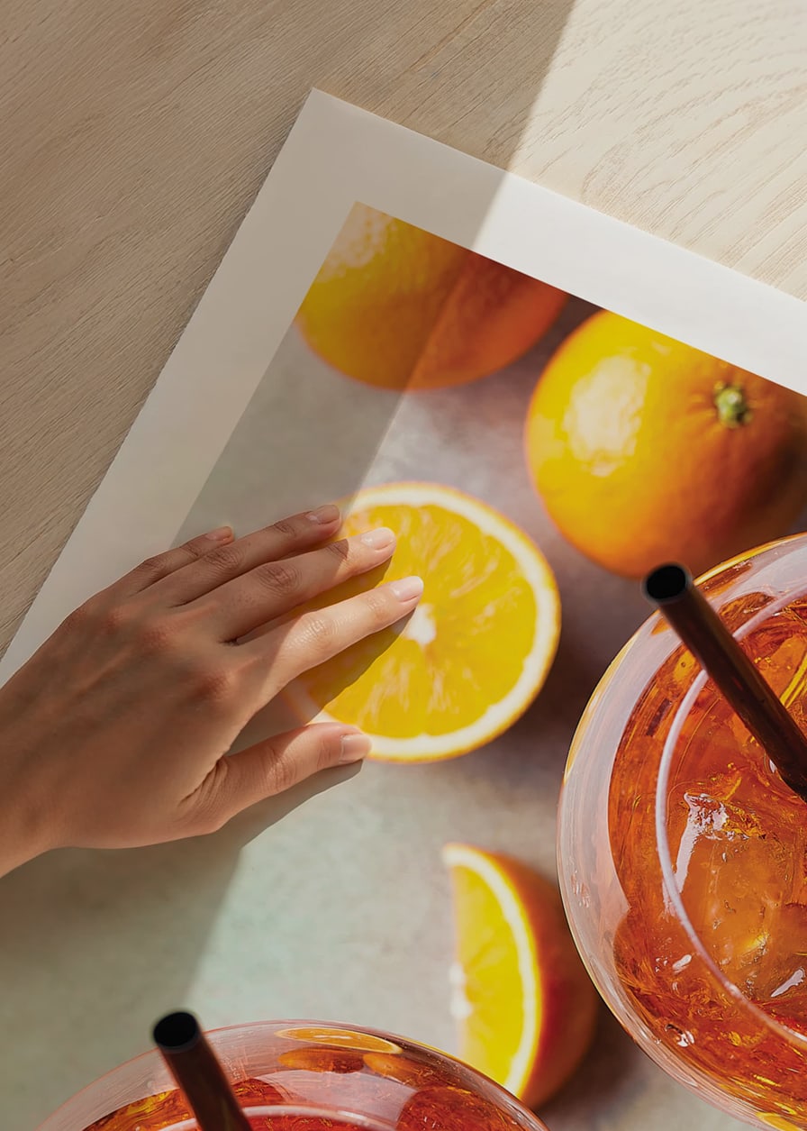 Photograph of two Aperol Spritz with orange slices from above-12