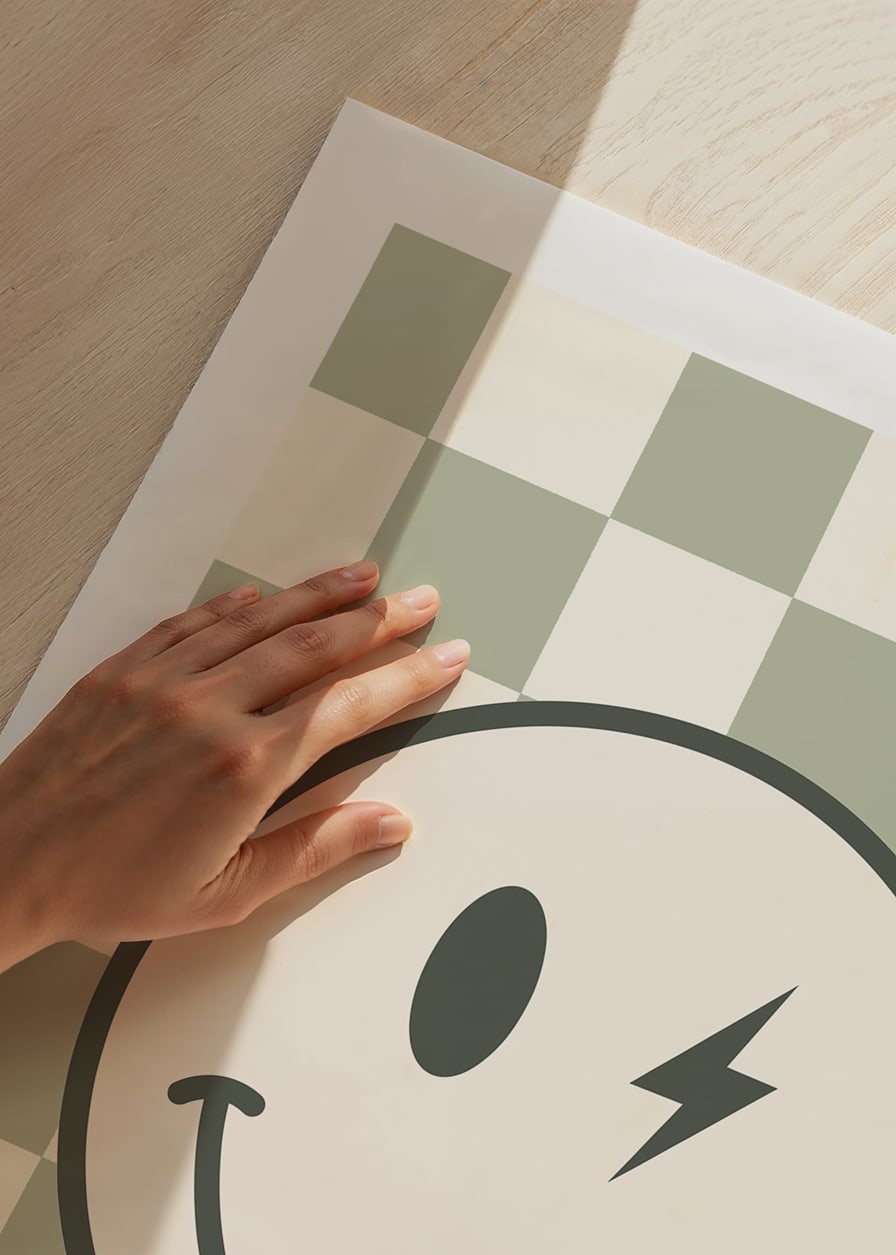 Graphic smiley with lightning detail on green and white checkered background-12