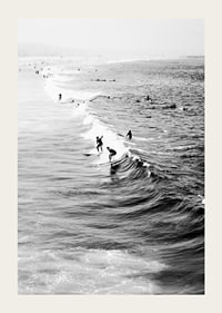 Black and white photography of surfers on waves at long beach-3