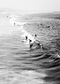 Black and white photography of surfers on waves at long beach-7