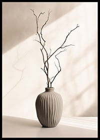Ceramic vase with thin twigs against light, soft background-6