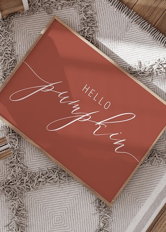 White handwritten text 'Hello Pumpkin' in script style on warm autumn red background-12