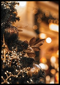 Close-up of fir tree with golden decorations and warm lights-6
