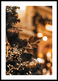 Close-up of fir tree with golden decorations and warm lights-0