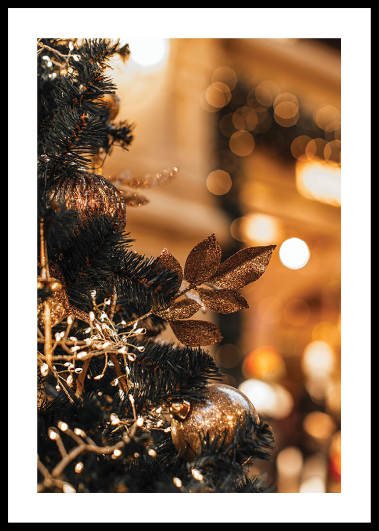 Close-up of fir tree with golden decorations and warm lights-12
