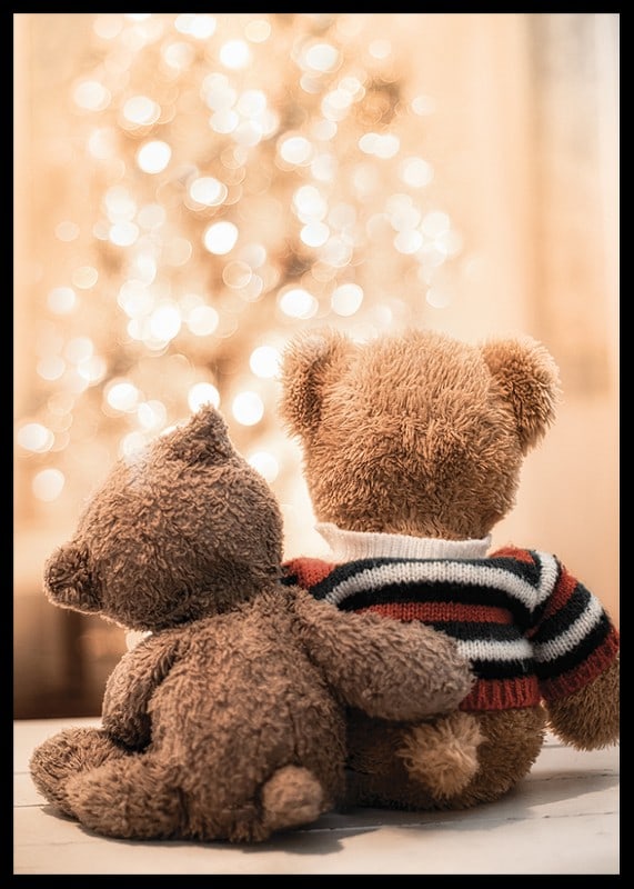 Two teddy bears from behind against bright Christmas tree, soft colors-12