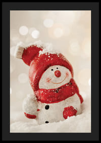 Snowman decoration with red hat and scarf in snow, photographed-4