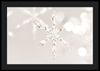 Close-up of sparkling crystal snowflake decoration against light background-4