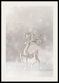 Glittering decorative deer in silver against light blurred background-2