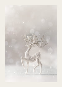 Glittering decorative deer in silver against light blurred background-3
