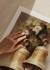 Watercolor of two gold-colored Christmas bells with holly and red berries-9