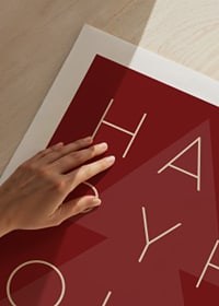 Graphic text illustration in beige with Christmas tree on red background-9