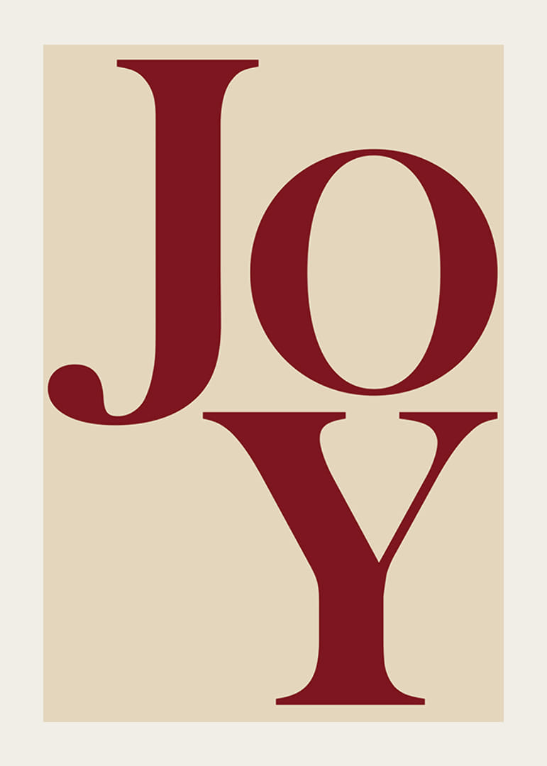 Stora röda bokstäver som formar ordet Joy på beige bakgrund-12