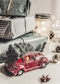 Green polka dot Christmas presents and red toy car with fir tree-7