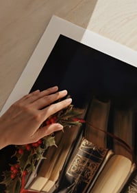 Illustrated classic books with holly and red bow-9