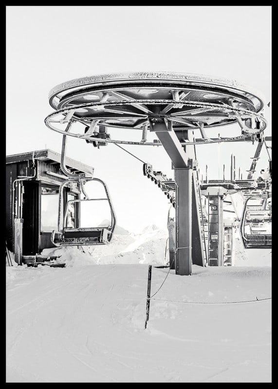 Black and white ski lift station in winter landscape with snow-covered details-12