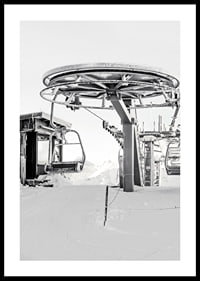 Black and white ski lift station in winter landscape with snow-covered details-0