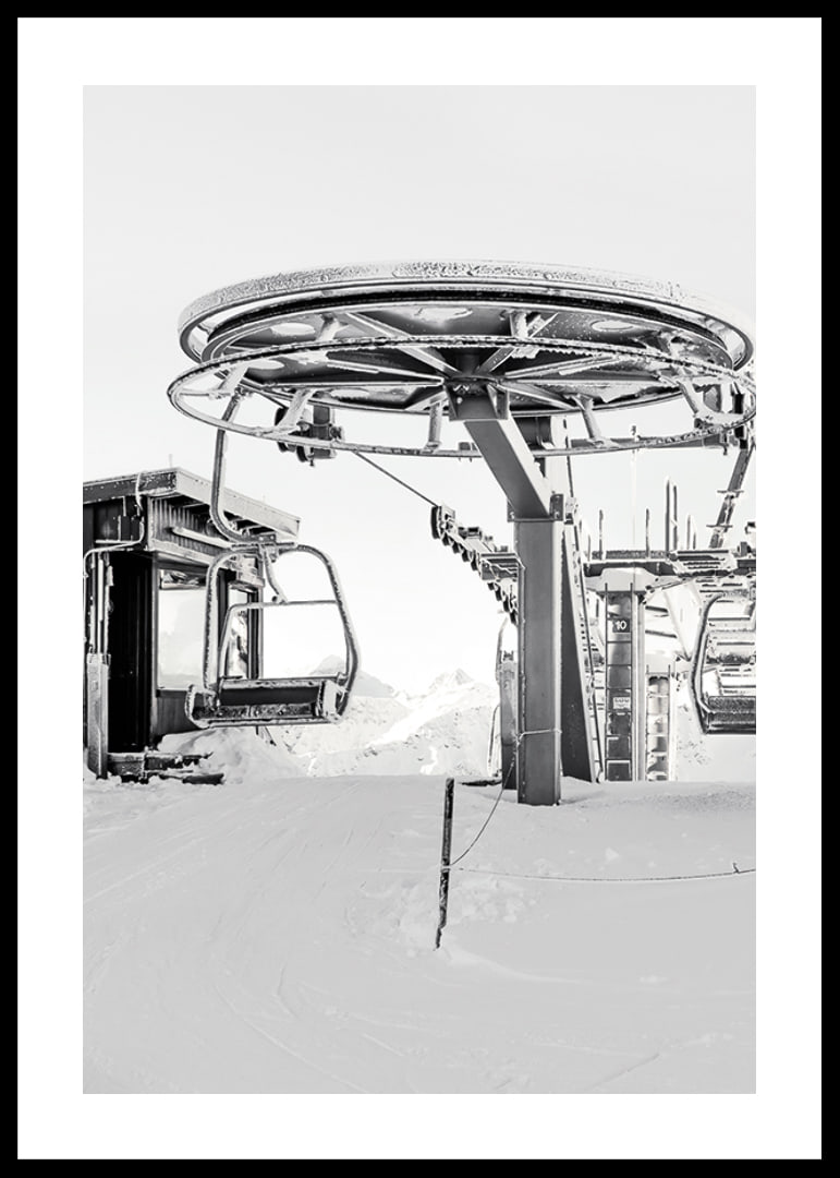 Black and white ski lift station in winter landscape with snow-covered details-12
