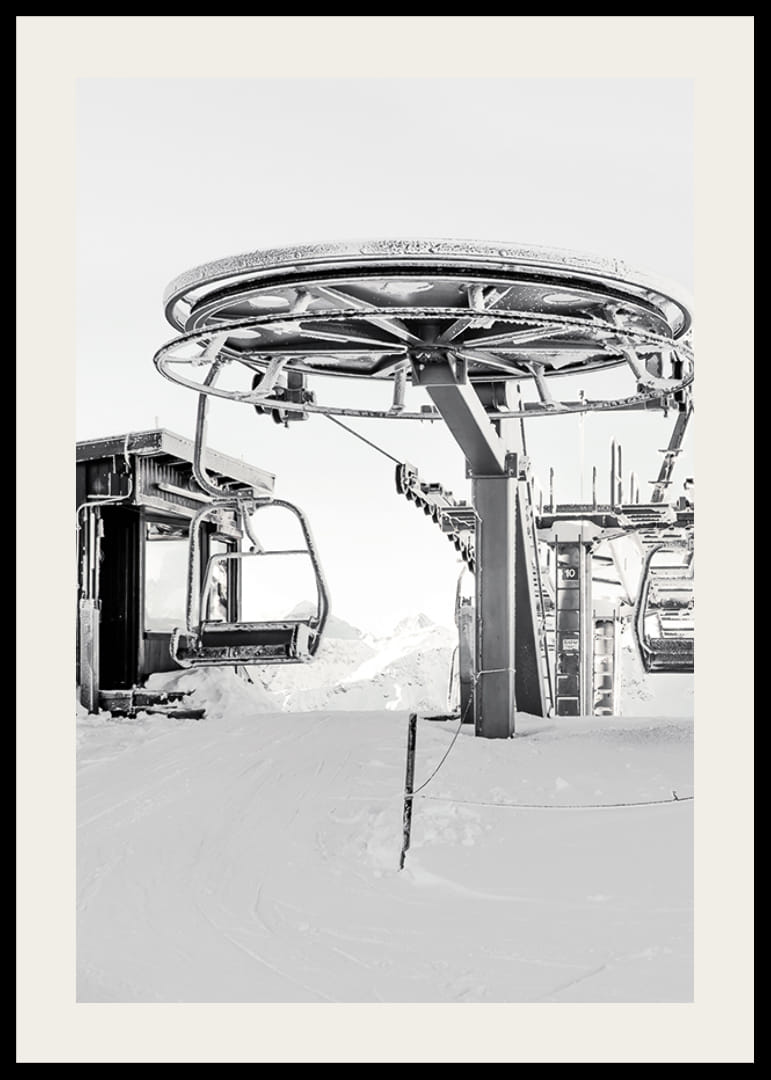 Black and white ski lift station in winter landscape with snow-covered details-12