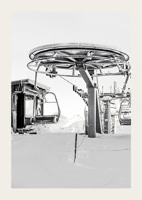 Black and white ski lift station in winter landscape with snow-covered details-3