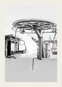 Black and white ski lift station in winter landscape with snow-covered details-3
