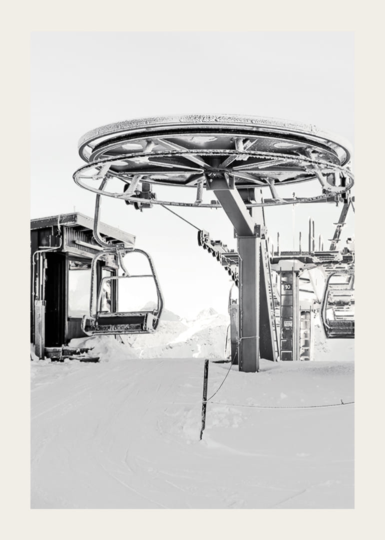 Black and white ski lift station in winter landscape with snow-covered details-12