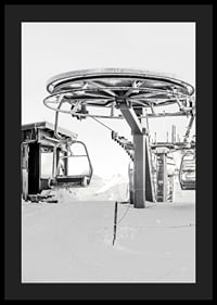 Black and white ski lift station in winter landscape with snow-covered details-4
