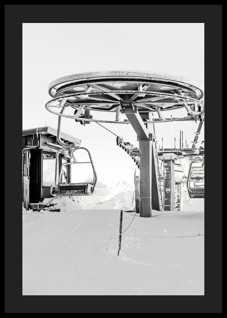 Black and white ski lift station in winter landscape with snow-covered details-12