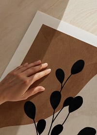 Abstract plant silhouette in black against brown and beige shapes-9