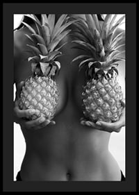 Black and white photo of woman holding two pineapples to her chest-4
