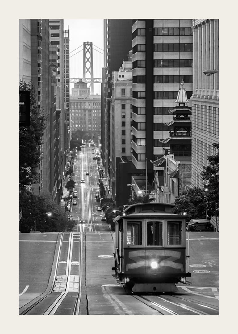 Black and white city view with San Francisco tram and bridge in the background-12