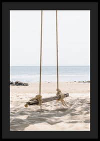 Photograph of wooden swing on light sandy beach by the sea-4