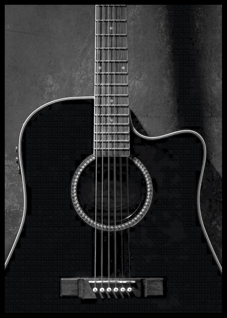 Black and white close-up of acoustic guitar against concrete background-12