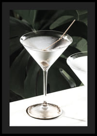 Photographic close-up of martini glass with olive and iced surface-4