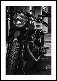 Black and white close-up of classic motorcycle in urban environment-2