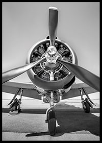 Black and white photograph of old propeller plane from the front-6