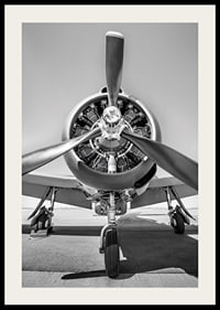 Black and white photograph of old propeller plane from the front-2
