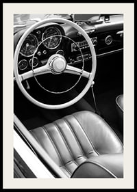 Black and white close-up of classic car interior with steering wheel-2