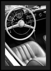 Black and white close-up of classic car interior with steering wheel-4