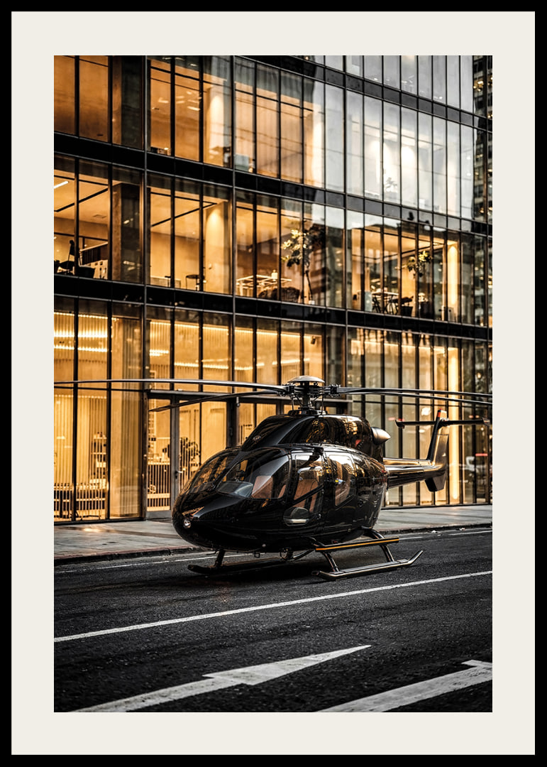 Black helicopter on city street in front of glass facade in evening light-12
