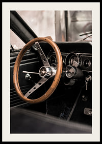 Photograph of classic car interior with wooden steering wheel in focus-2