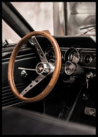 Photograph of classic car interior with wooden steering wheel in focus-6