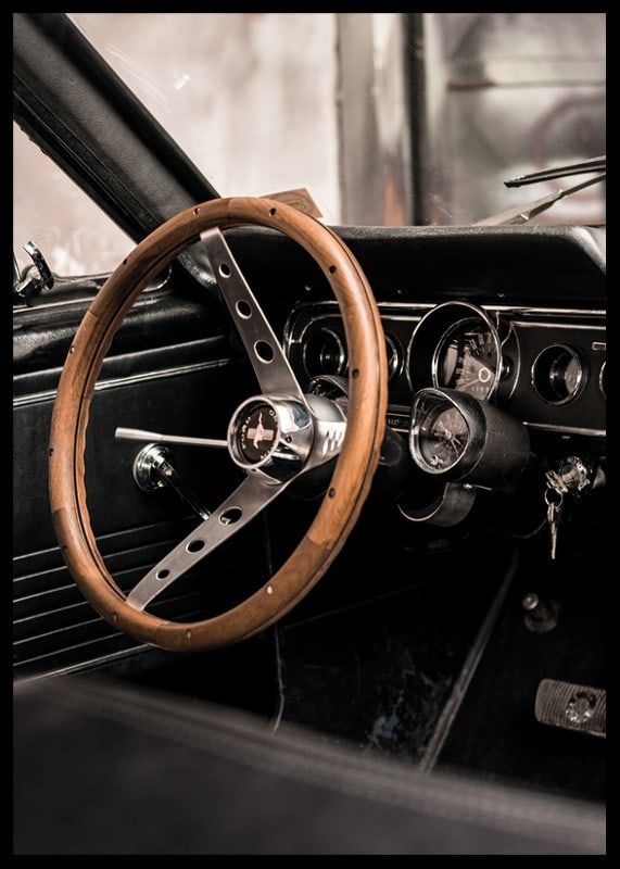 Photograph of classic car interior with wooden steering wheel in focus-12