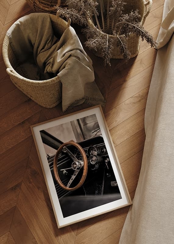 Photograph of classic car interior with wooden steering wheel in focus-12