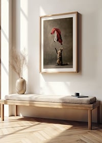Standing cat reaches for sweeping red black white satin cloth-8