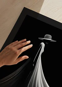 Black and white silhouette of woman in wide white dress and hat-9